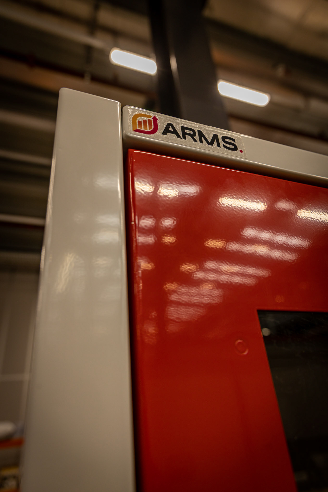 arms logo on a cabinet